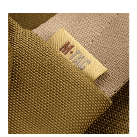 M-Tac Carry Sling Taske Elite Gen.IV med Velcro i kakhifarvet tæt vævet nylon med tydeligt broderet mærkelogo, galleri position 1.