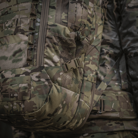 M-Tac Rygsæk Large Gen.IV Elite i slidstærkt Cordura-materiale, camouflagedesign, egnet til daglig brug og transport af adskilte våben.