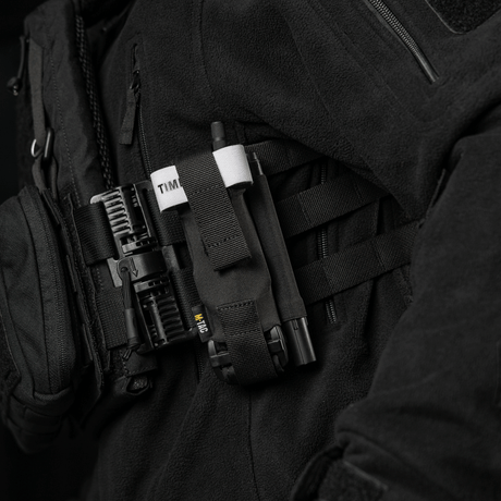 M-Tac Elastisk Tourniquet Pouch Molle Gen.III fastgjort til taktisk vest