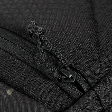 Nærbillede af lynlåsdetalje på M-Tac Satellite Magnet Taske Elite Hex i Cordura-materiale.