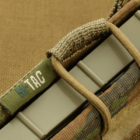 M-Tac Pistol Mag Pouch Gen.3 med justerbare plastik-sideskiver og elastik, fremstillet af Cordura 500D, kompatibel med MOLLE-systemet.