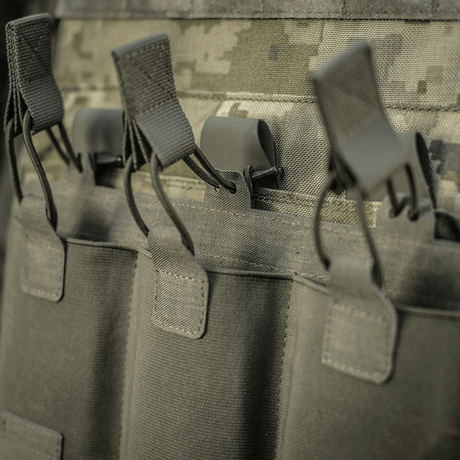 M‑Tac Elastisk Triple Magazine Pouch Elite med holdbare stropper og laser cut design for hurtig adgang til magasinerne.