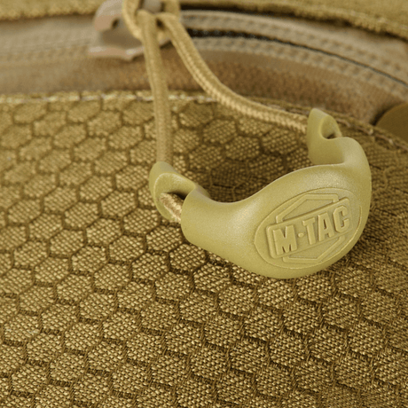 Nærbillede af M‑Tac Cross Bag Elite Hex med Cordura 500 materiale og YKK lynlåsdetalje.