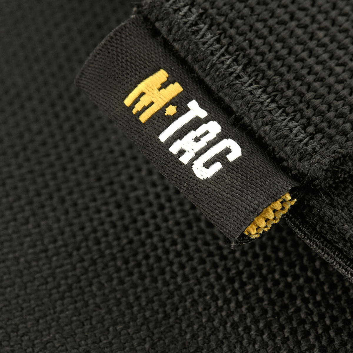 M‑Tac Front Panel til Cuirass QRS med M‑Tac logo og sort Cordura 500D stofdetalje, ideel til militær brug og ekstra udstyr.
