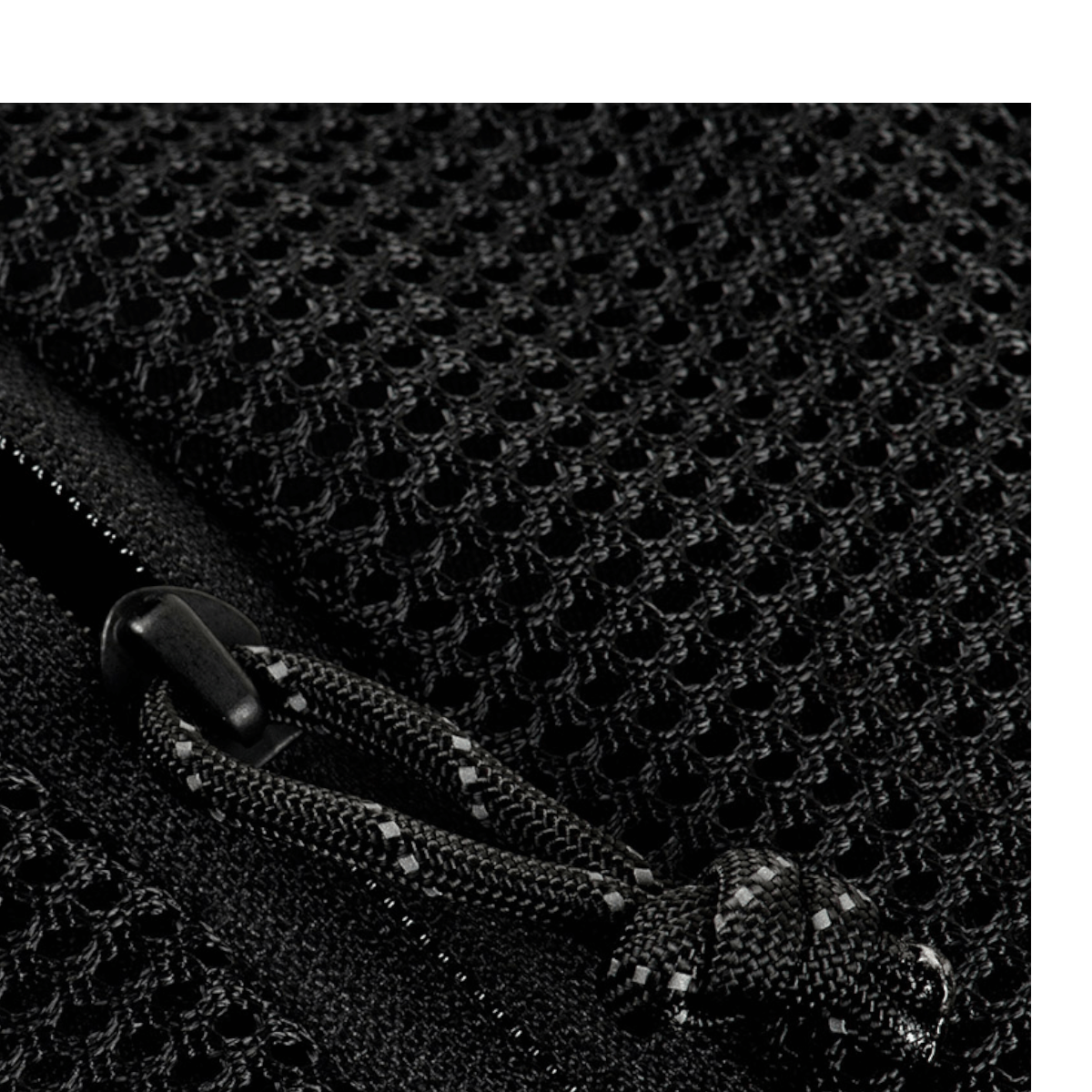 Detaljebillede af M-Tac Sling Pistoltaske Elite Hex lynlås og snor i holdbart materiale.