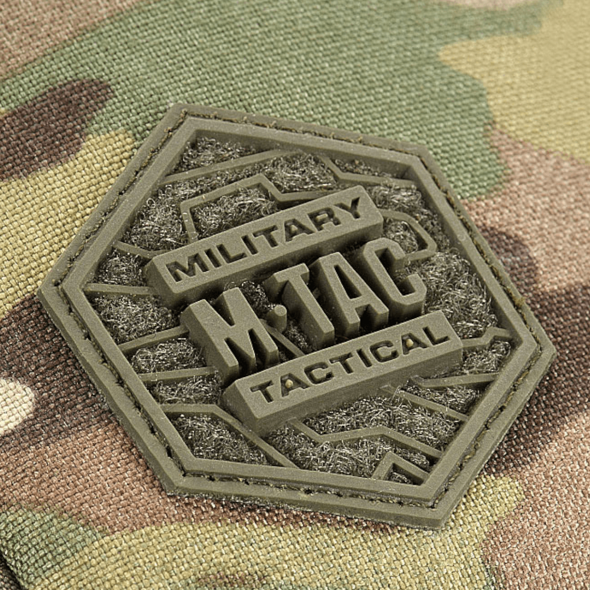 M-Tac Sling Pistoltaske Elite Hex med kamuflage og Military Tactical badge af Cordura materiale.