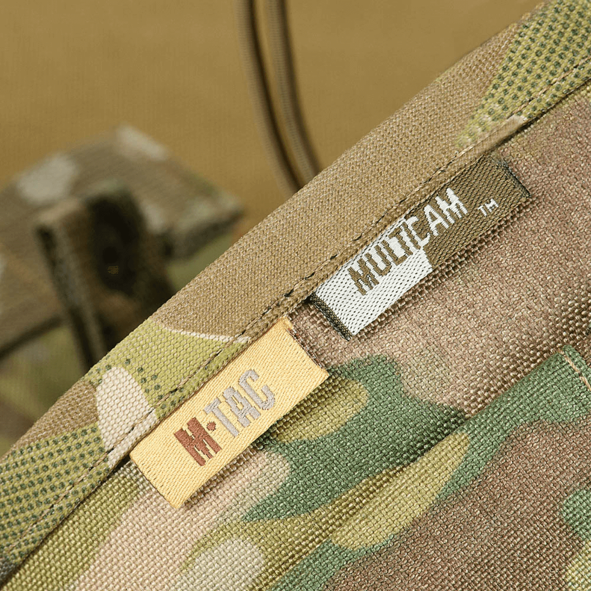 Nærbillede af M‑Tac Magasinsæk Dump Pouch Lite Elite med camouflage mønster og mærker detalje.