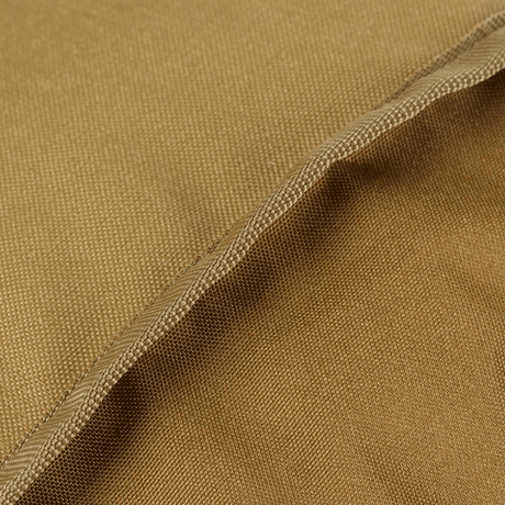 Materialedetalje af M-Tac Pouch Sukharka Gen.3 XL i Cordura 500D, hårdført materiale i brun nuance.