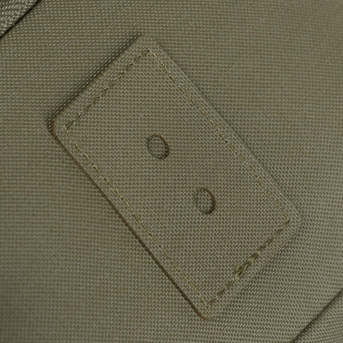 Nærbillede af grøn tekstur med trækhuller