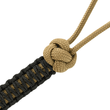 Nærbillede af M-Tac Knife Lanyard Ninja i paracord med en knude, stilfuldt og praktisk tilbehør til knive.