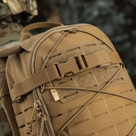 M-Tac Rygsæk Sturm Elite Gen.II med elastisk snøring og MOLLE system til ekstra udstyr, velegnet til feltoverlevelse.