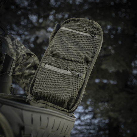 Åben lomme på M-Tac Rygsæk Sturm Elite Gen.II med netlommer til EDC-udstyr, ideel til feltophold og ekstraudstyr.