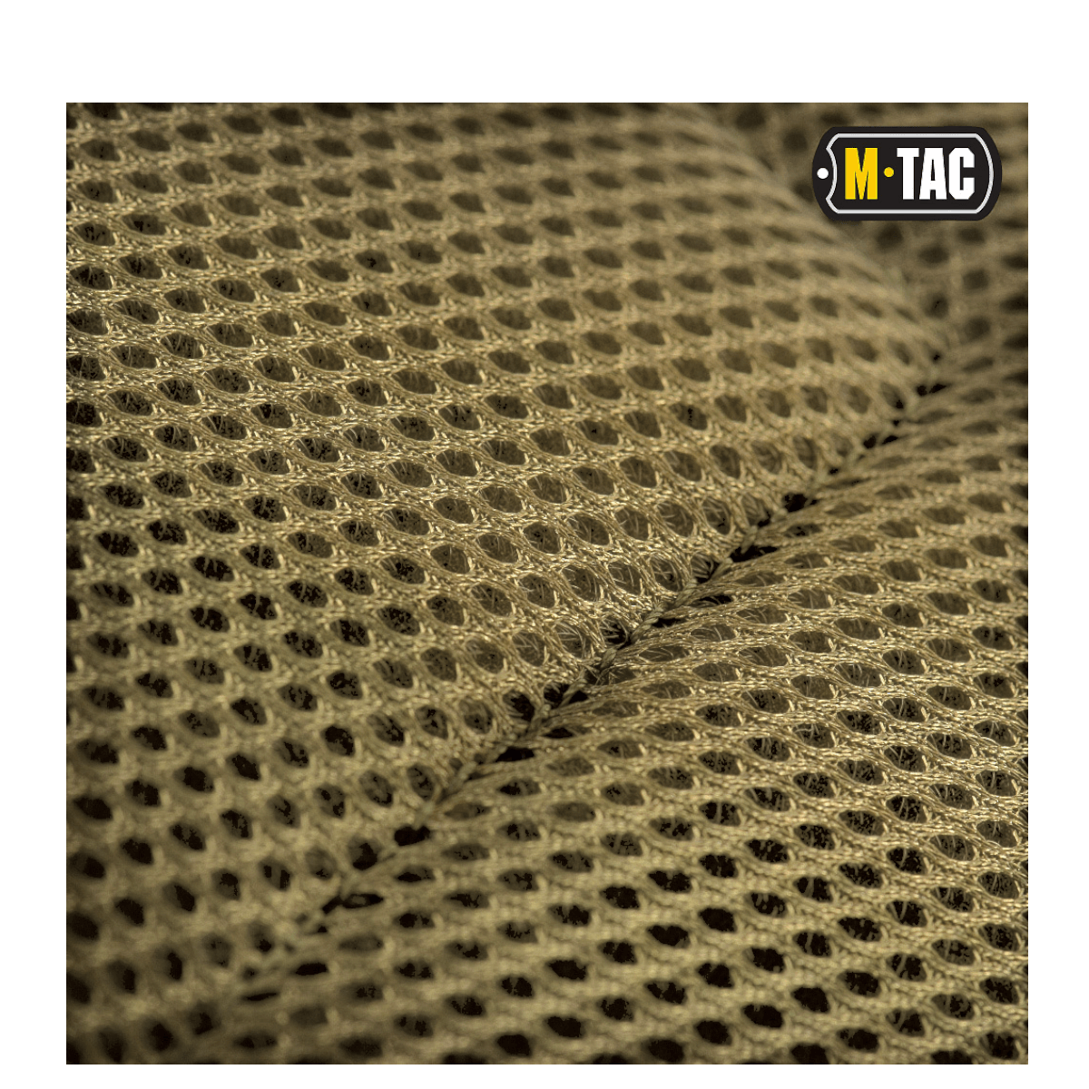 Close-up af M-Tac Assault Pack materiale med MOLLE-system og netstruktur i brun farve, ideel til komfort og holdbarhed.