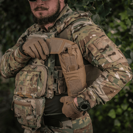 M-Tac Mediclomme Small Vertical Elite i slidstærkt multicam nylon med NIJ-certificering, vist i gallery position 1, til taktisk medicinsk opbevaring.
