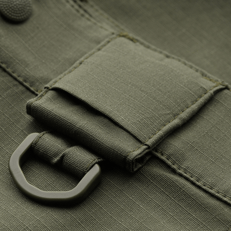 Nærbillede af M-Tac Shorts Aggressor Gen.II Flex i rip-stop materiale med Teflon. Ideel til træning og fritid, slidstærkt design.