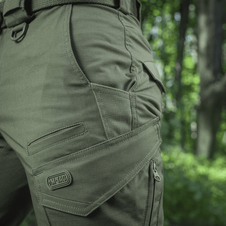 M-Tac Shorts Aggressor Gen.II Flex i skov, let og holdbart design, perfekt til udendørs aktiviteter med taktisk stil.