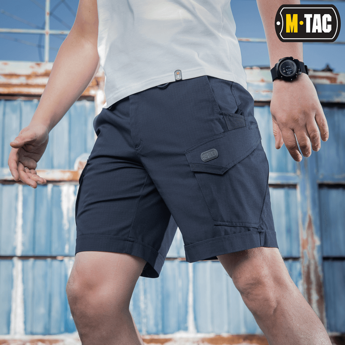 M-Tac Shorts Aggressor Short i blå med taktiske funktioner, ideelle til varme dage