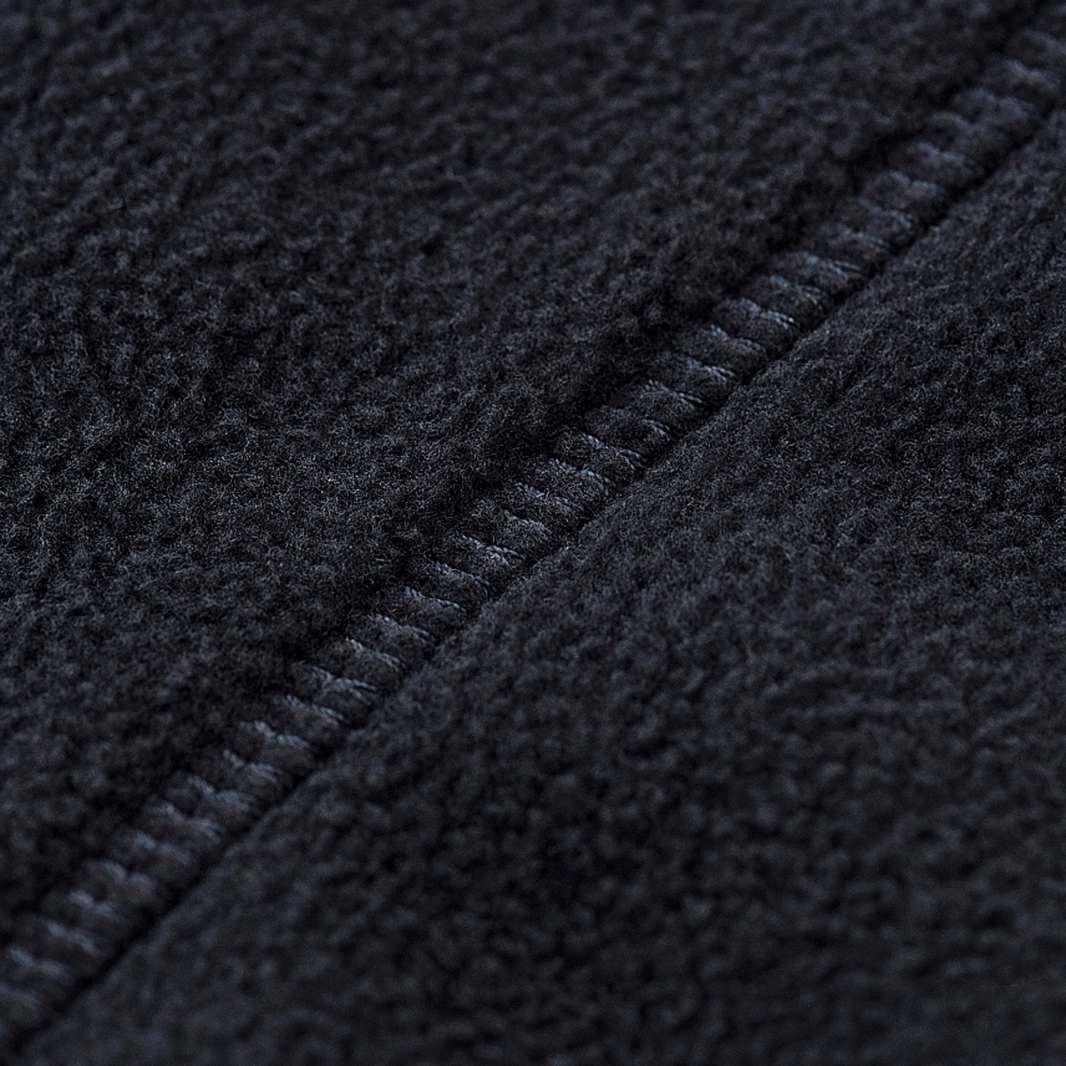 Nærbillede af stofstruktur på M-Tac Lite Microfleece Hættetrøje