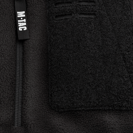 Detalje af M-Tac Alpha Microfleece Jakke Gen.II med forstærket fleece og lynlås, perfekt til taktisk brug i koldt vejr.