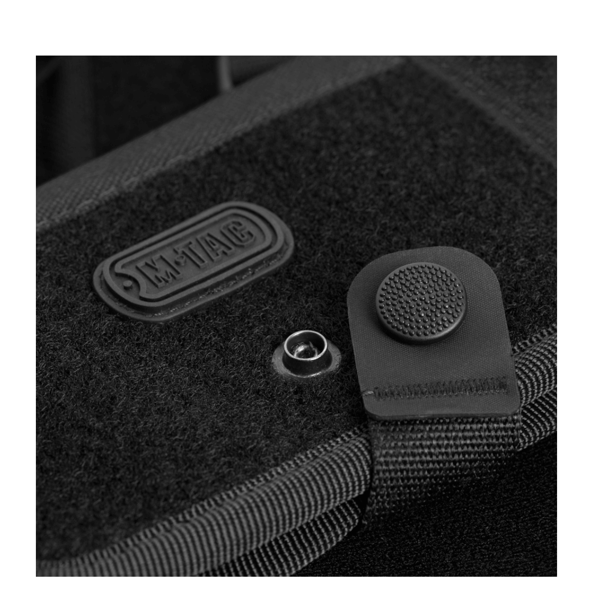 M-Tac Pung med Patch Panel Elite Large i slidstærkt 1000D CORDURA® med velcro-lukning og knapdetalje. Perfekt til opbevaring og organisation.