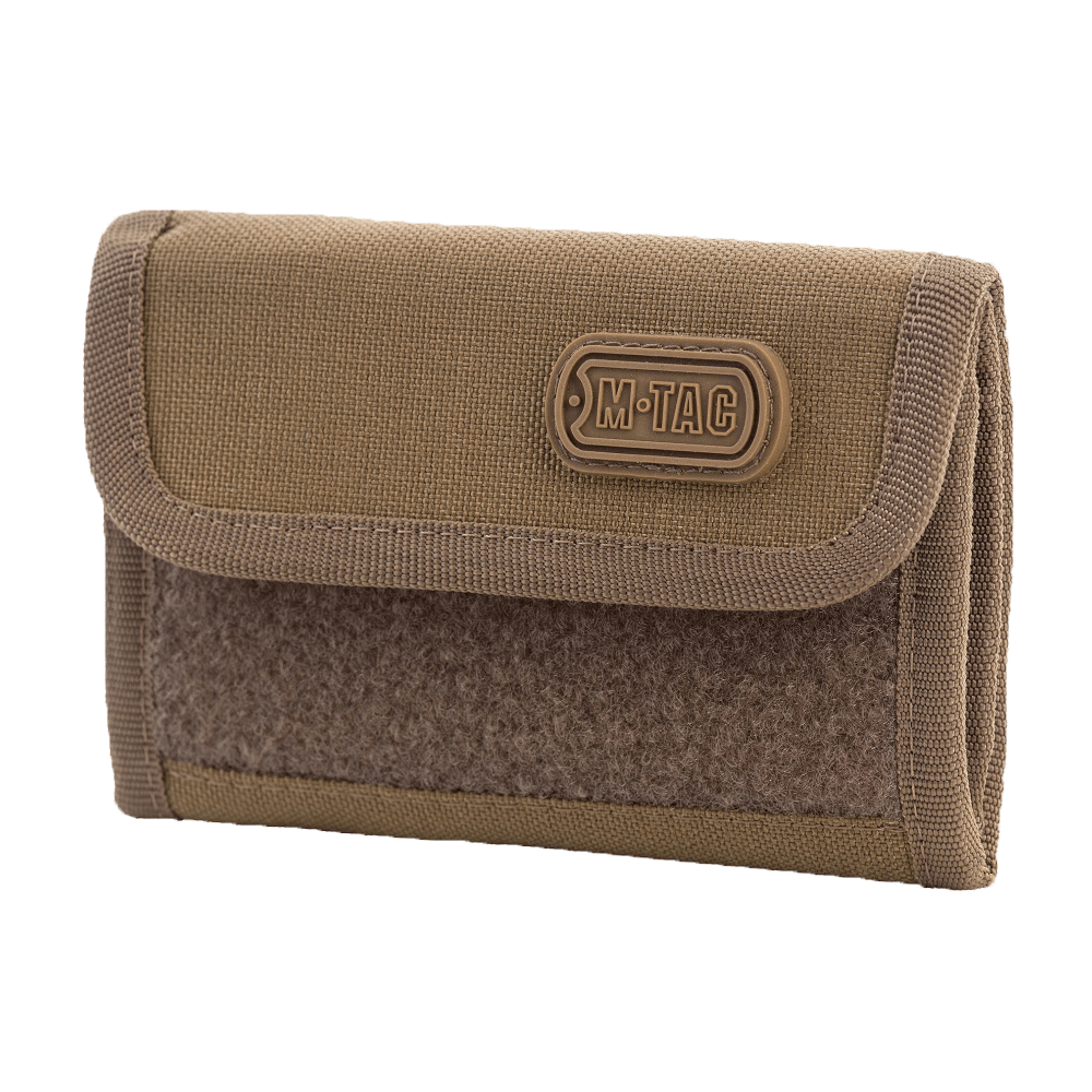 M-Tac Pung med Patch Panel Elite i holdbart CORDURA® materiale, militærstil pung med rum til kreditkort og Velcro-lukning.