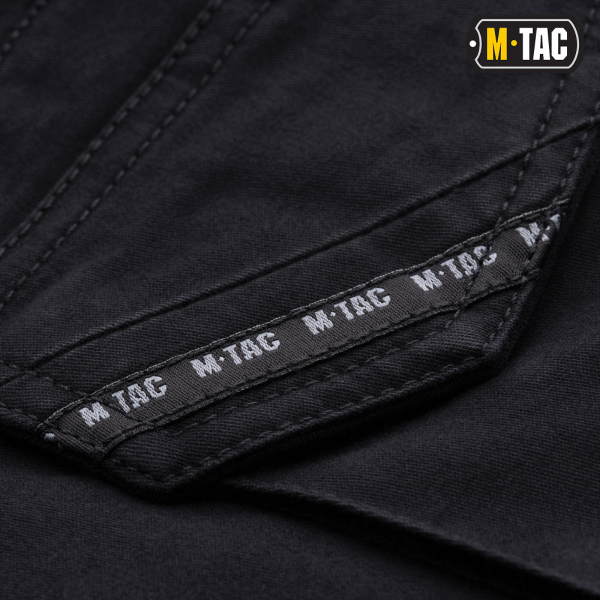 M-Tac Bukser Aggressor Vintage lommedesign i bomuldsstof med M-Tac logo, perfekt til stilfuld hverdagsbrug og feltarbejde.
