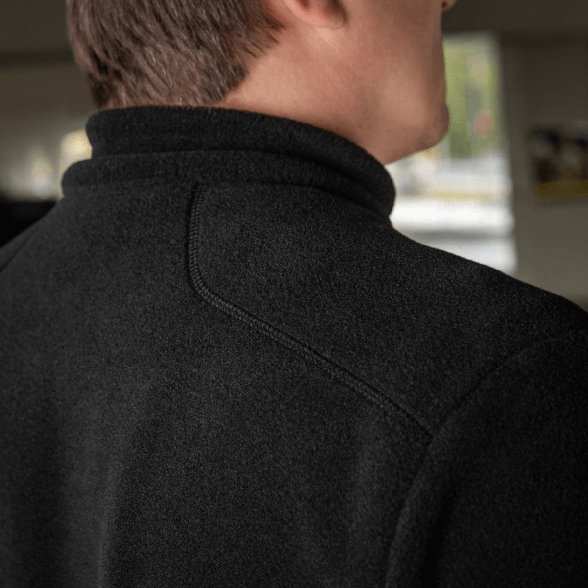 M-Tac Nord Polartec Fleecejakke set bagfra med højkvalitets Polartec® 200 Series fleece, designet til varme og funktionalitet.