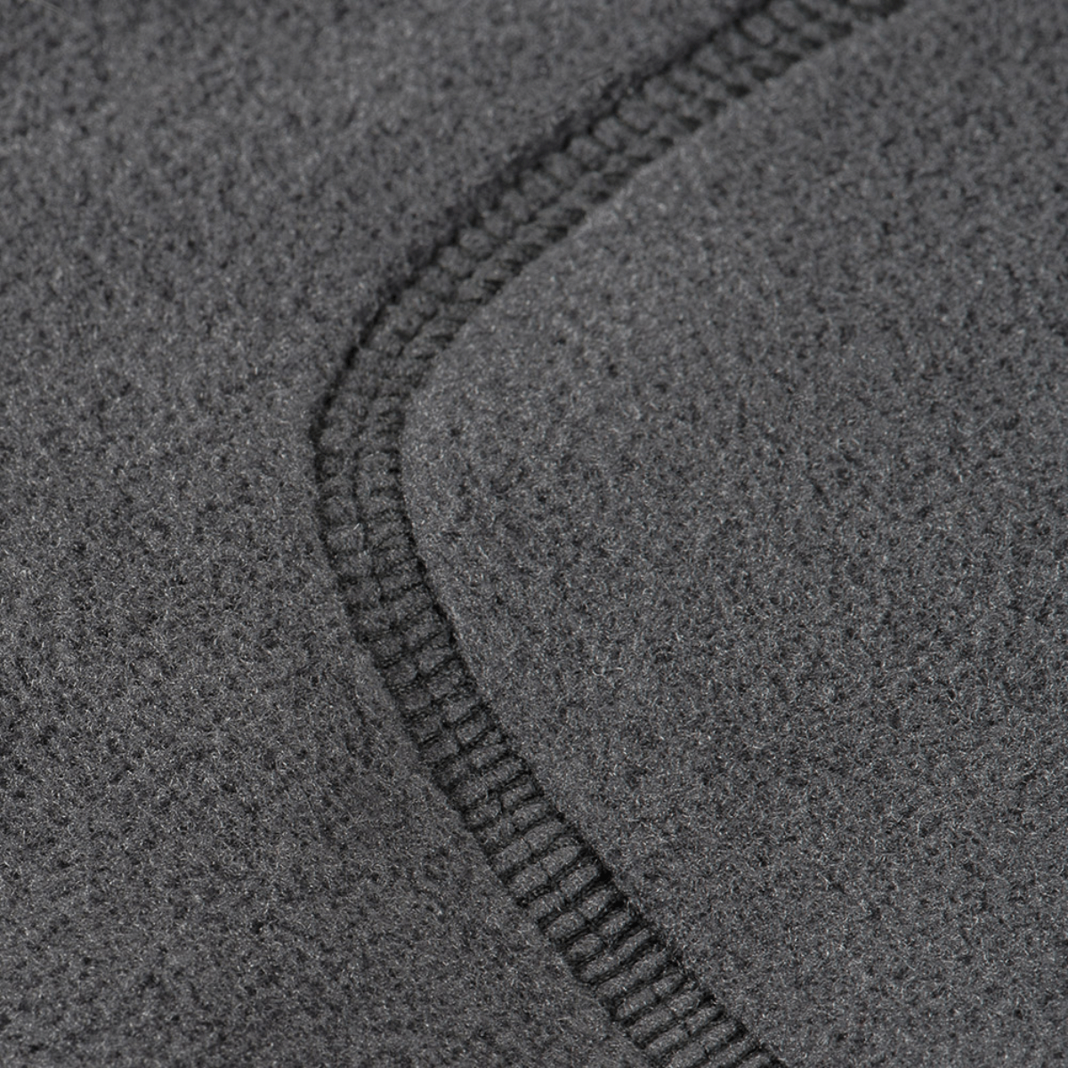 Detalje af M-Tac Nord Polartec Fleecejakke med premium Polartec® 200 Series fleece, der viser tekstur og syninger.