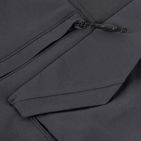 Nærbillede af detalje på M-Tac Aggressor Summer Flex Shorts med funktionelle lommer og lynlås.