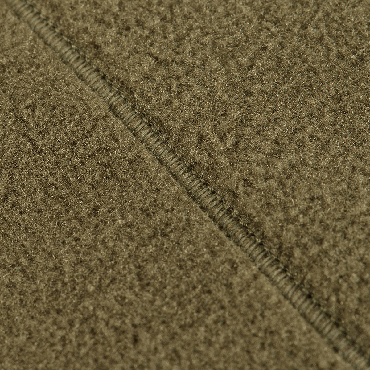 Nærbillede af M-Tac Sprint Fleece Sweatshirt Polartec materiale, viser holdbart, blødt fleece med varmebevarende egenskaber.