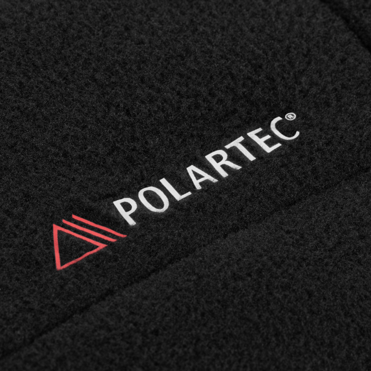 Polartec-fleece stofdetalje på M-Tac Combat Fleece Polartec Jakke, fremstillet af slidstærk 100% polyester for optimal varme.