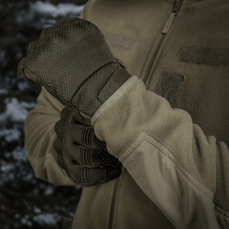M-Tac Combat Fleece Polartec Jakke med YKK lynlåse og vindbestandige indsatser. Varm og slidstærk til taktisk brug.