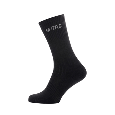 M-Tac Sokker Mk.1 med komfortpolstring og svangstøtte, designet til optimal fugttransport og stabilitet under krævende aktiviteter.