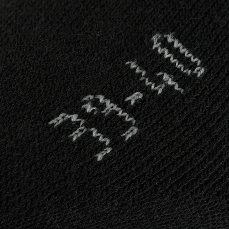 Nærbillede af M-Tac Sokker Winter Wool i sort uld med grå mærkning; ideelle til varme og komfort i den kolde sæson.