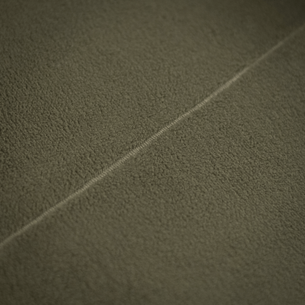 Nærbillede af M-Tac Tube Scarf Polartec-materiale i Polartec® Micro Series fleece, der viser tekstur og søm.