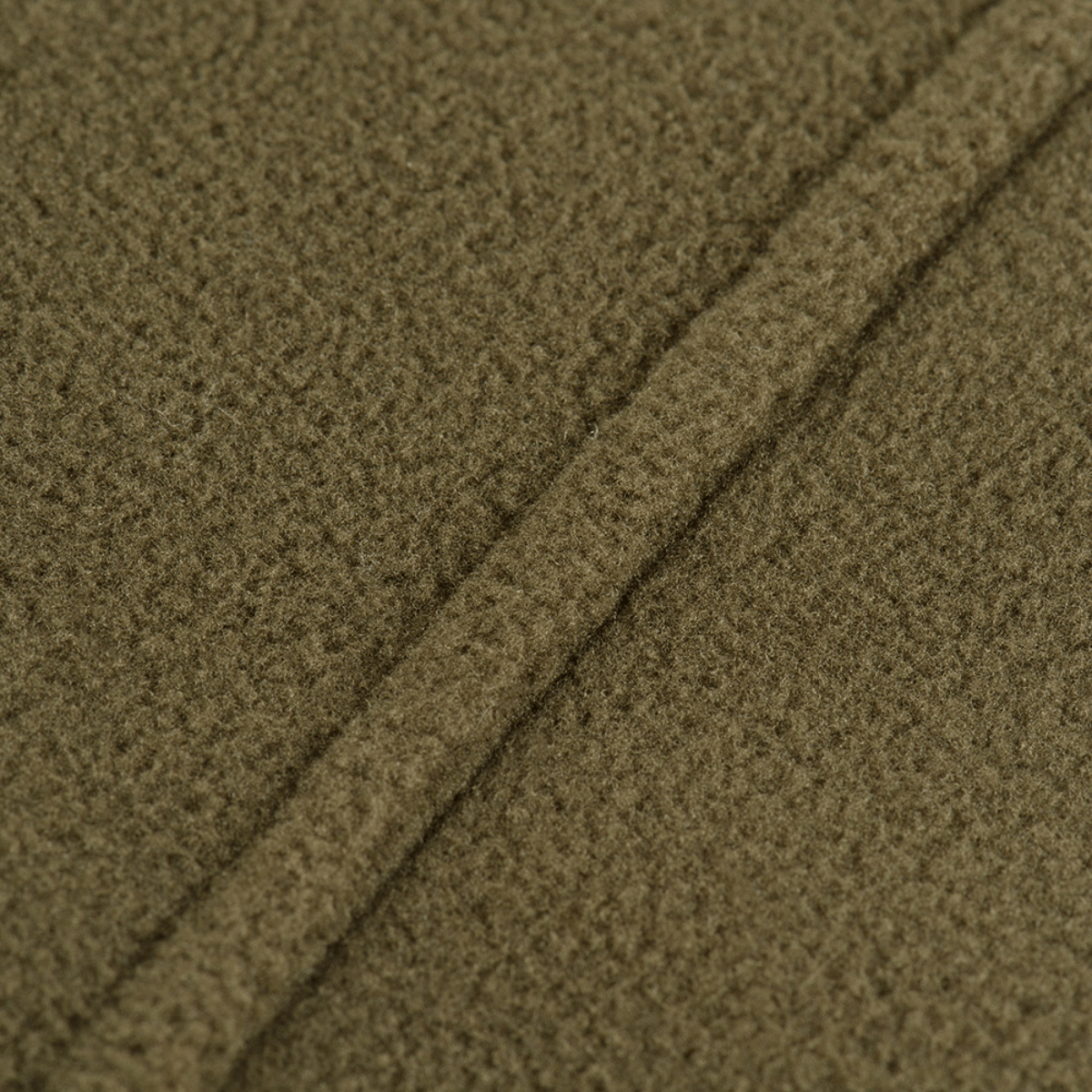 M-Tac Delta Polartec Fleecejakke stofdetalje fremstillet af Polartec® Micro Series-fleece, ideel til kolde dage med varmeisolering.