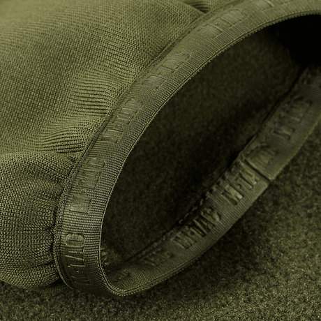 Detalje af M-Tac Polartec Sport Fleecejakke i olivengrøn farve, viser elastisk kant og tekstur af premium Polartec® 200 Series fleece.