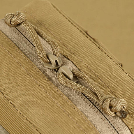 M-Tac Utility Taske Elite Small i slidstærkt materiale med dobbelt lynlås og robust syning, vist i galleri position 1.