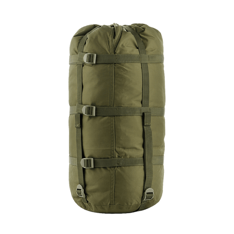 M-Tac Kompressionspose i slidstærkt nylon, ideel til opbevaring, med kompressionsstropper til pladsbesparing. Vandafvisende og robust design.