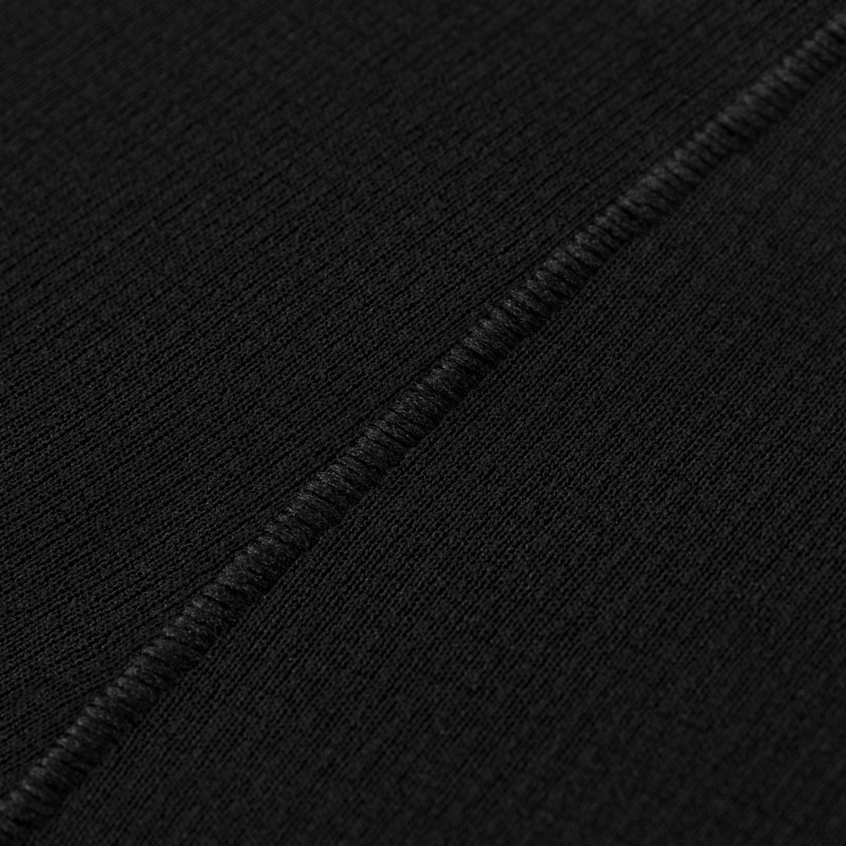 Detalje af stofstruktur af M-Tac Vinter Termobukser 3/4 Baselayer fremstillet af Pontetorto® fleece med flade sømme.