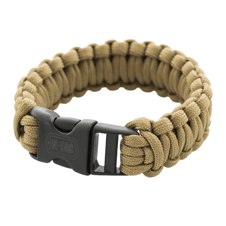 M-Tac Paracord Armbånd i beige med sort spænde, ideelt til friluftsliv og overlevelsesbrug, robust og stilfuldt design.
