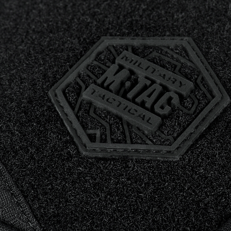 Nærbillede af M-Tac Sling Pistol Taske Elite Hex med Velcro logo i sort Cordura-materiale