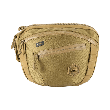 M-Tac Sphaera Hex Hardsling Bag Large Elite i sandfarvet med hexagon mønster og lynlåslomme foran, ideel til udendørs aktiviteter.