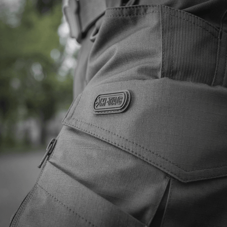 M-tac Taktiske Bukser Conquistador Gen. I Flex med polycotton Rip-stop Flex-stof til udendørsaktiviteter, set fra siden.