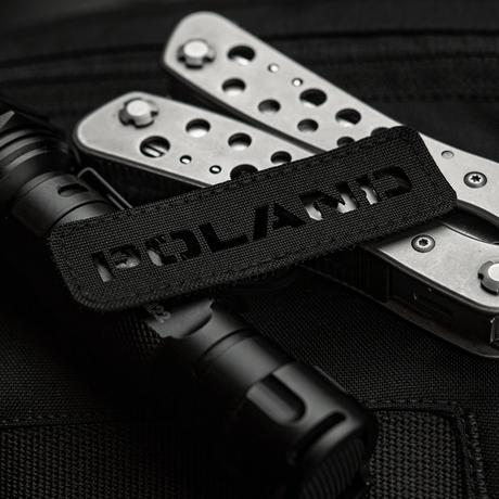M‑Tac Patch Poland End-to-End 25x80 perforeret Cordura 500D patch med laser cut design, fastgjort til udstyr med velcro.