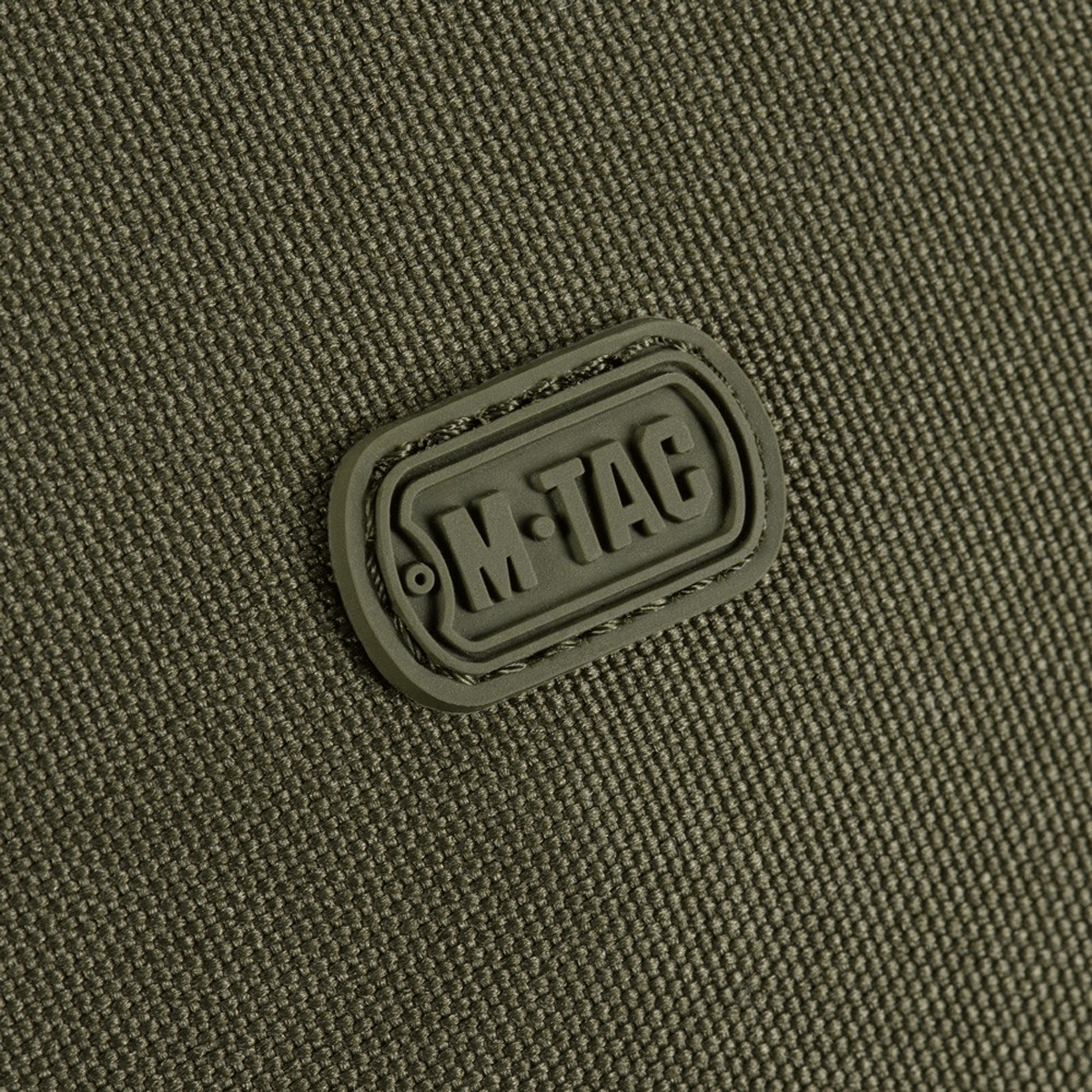 M-Tac Toilettaske i vandafvisende 600D polyester med PVC-belægning, ideel til rejser og hverdagsbrug. Kompakt og praktisk design.