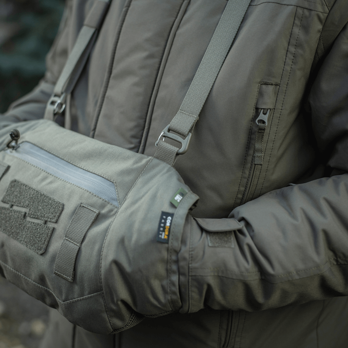 M-Tac Taktisk Håndvarmer Elite i slidstærkt Cordura 500D og fleece, perfekt til koldt vejr.