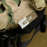 M‑Tac Vilha Hjelmdæksel Elite med MULCTICAM-camouflage designet til FAST hjelme med robust Cordura 500D og Laser Cut mesh.