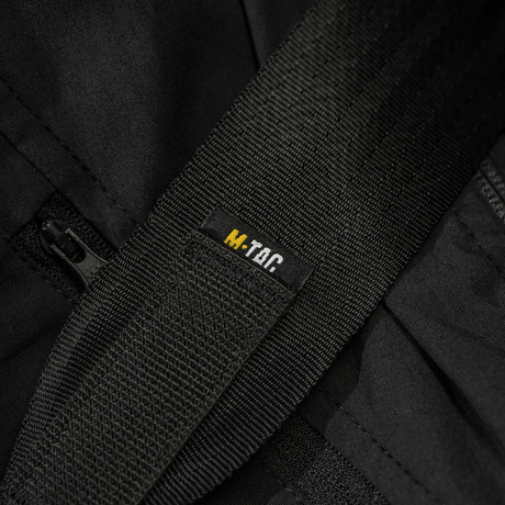 Nærbillede af M-Tac Tablet Bag Laser Cut Hex i sort Cordura-materiale med YKK lynlås og remdetaljer.