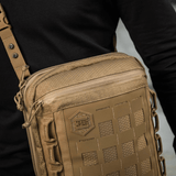 M-Tac Tablet Bag Laser Cut Hex i Cordura-materiale med Laser Cut MOLLE på fronten, velegnet til EDC, dokumenter og skjult våben.
